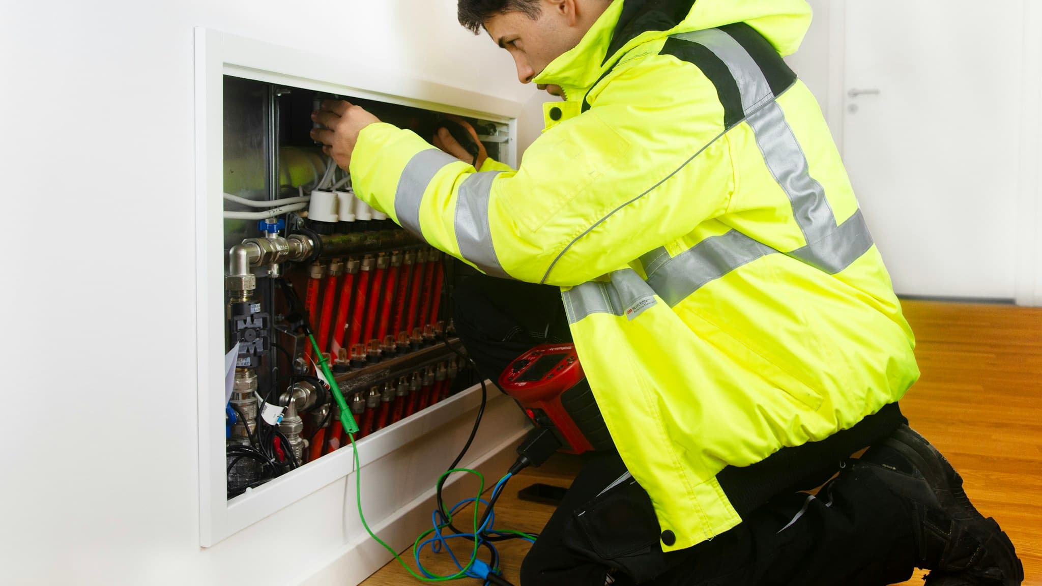 A trades technician completing a heating installation inside a utility cabinet, what does an ai agent do, Aceleron Intelligence
